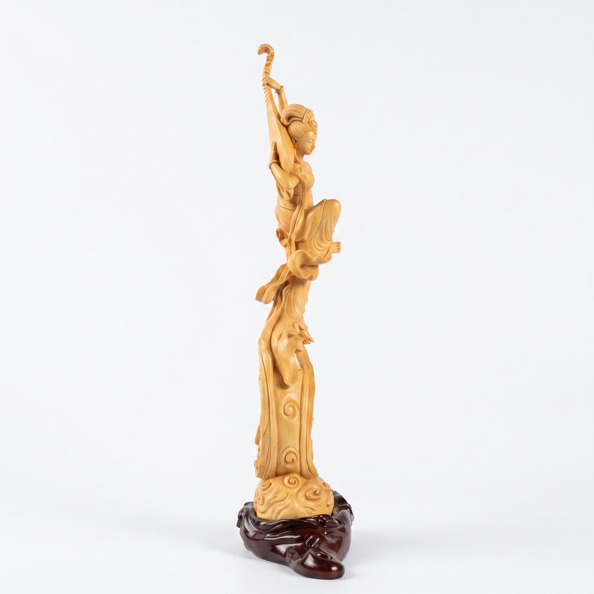 Boxwood Carving of Flying Apsara (Playing Pipa Behind Back)