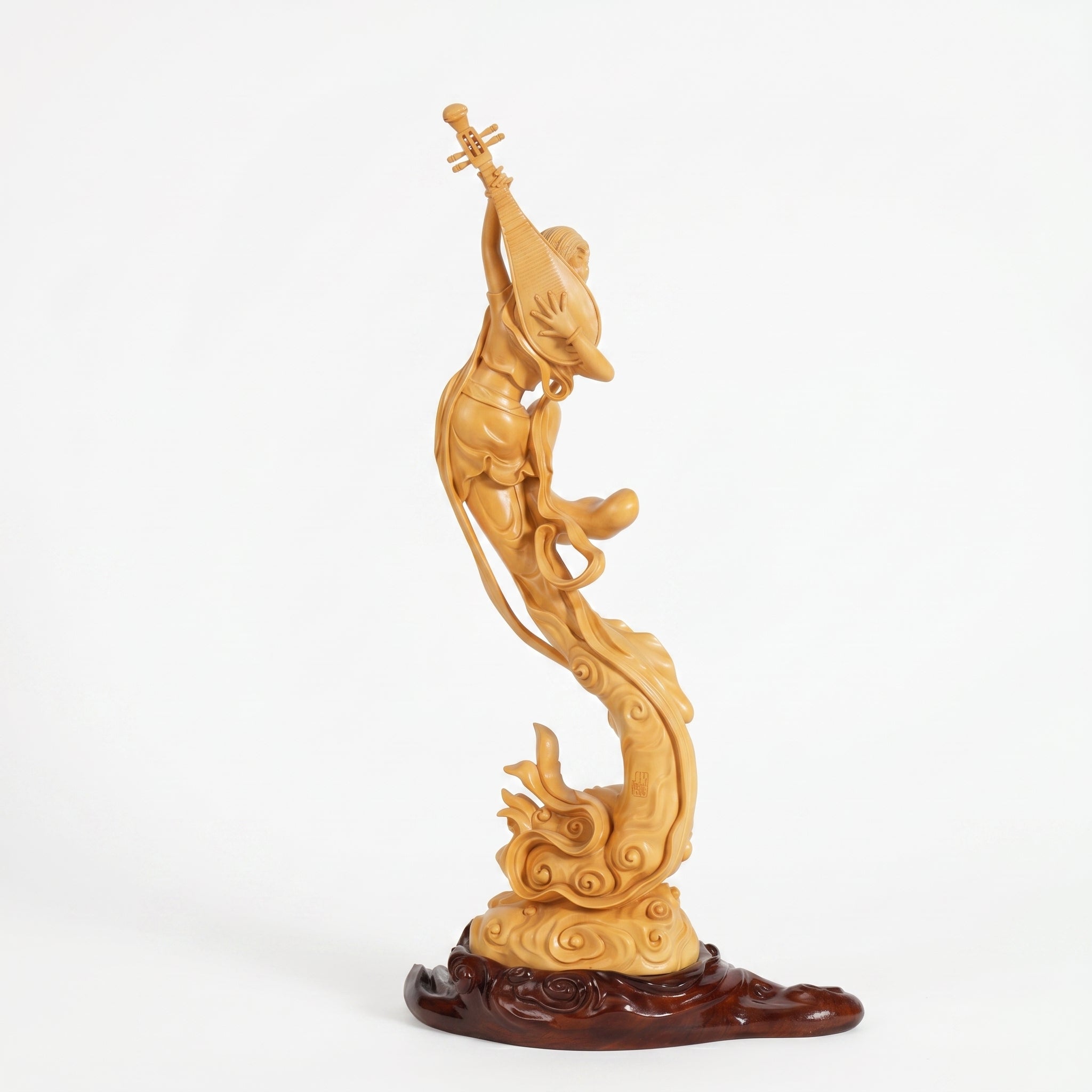 Boxwood Carving of Flying Apsara (Playing Pipa Behind Back)