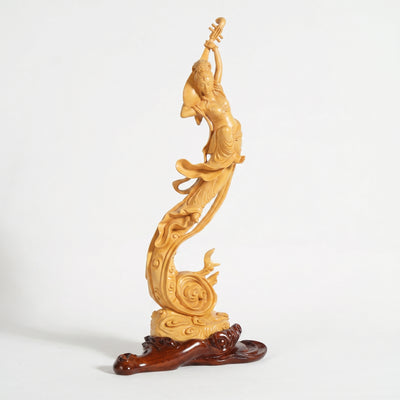 Boxwood Carving of Flying Apsara (Playing Pipa Behind Back)